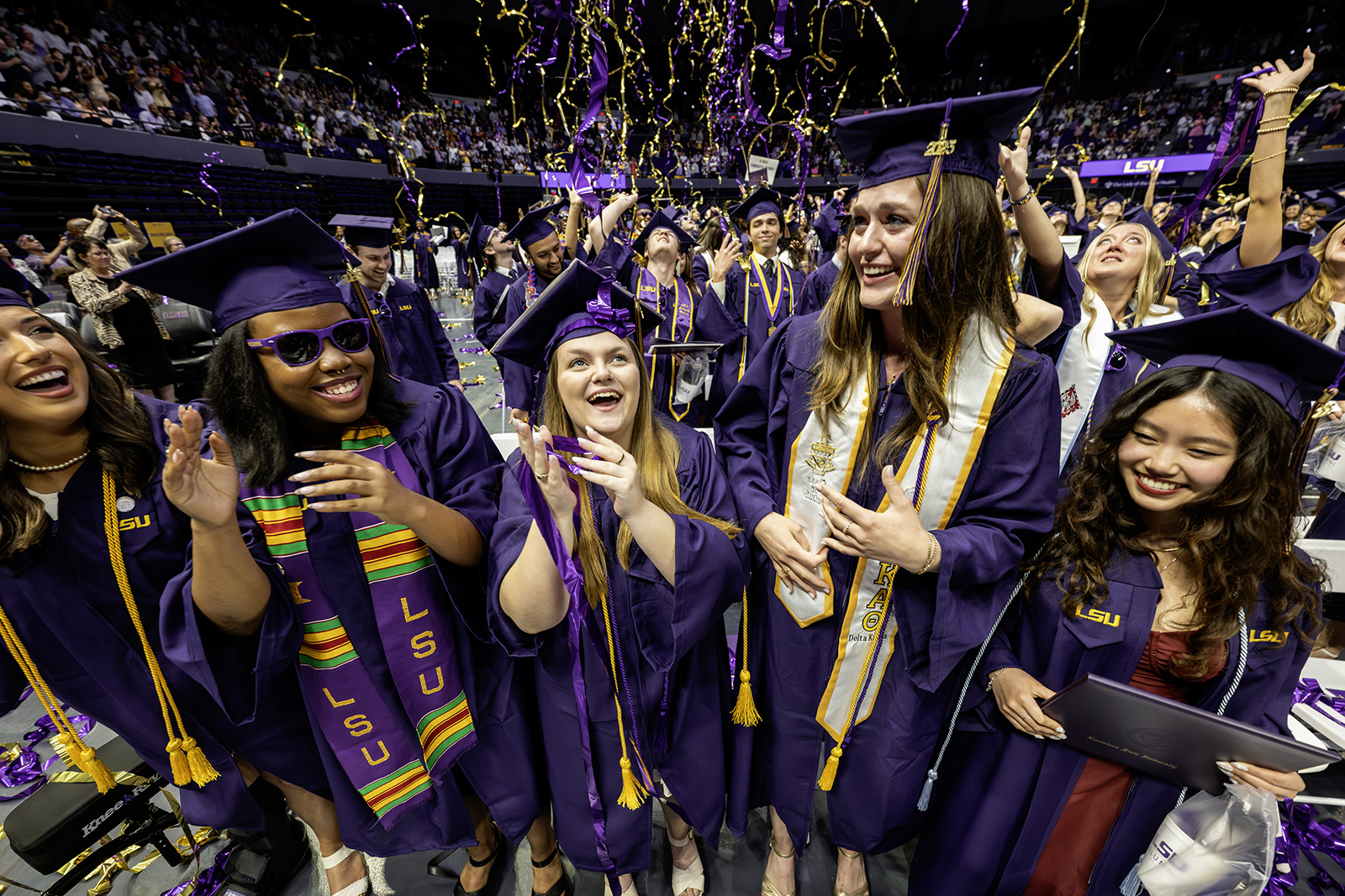 Commencement Celebration Group of LSU graduates celebrates at commencement