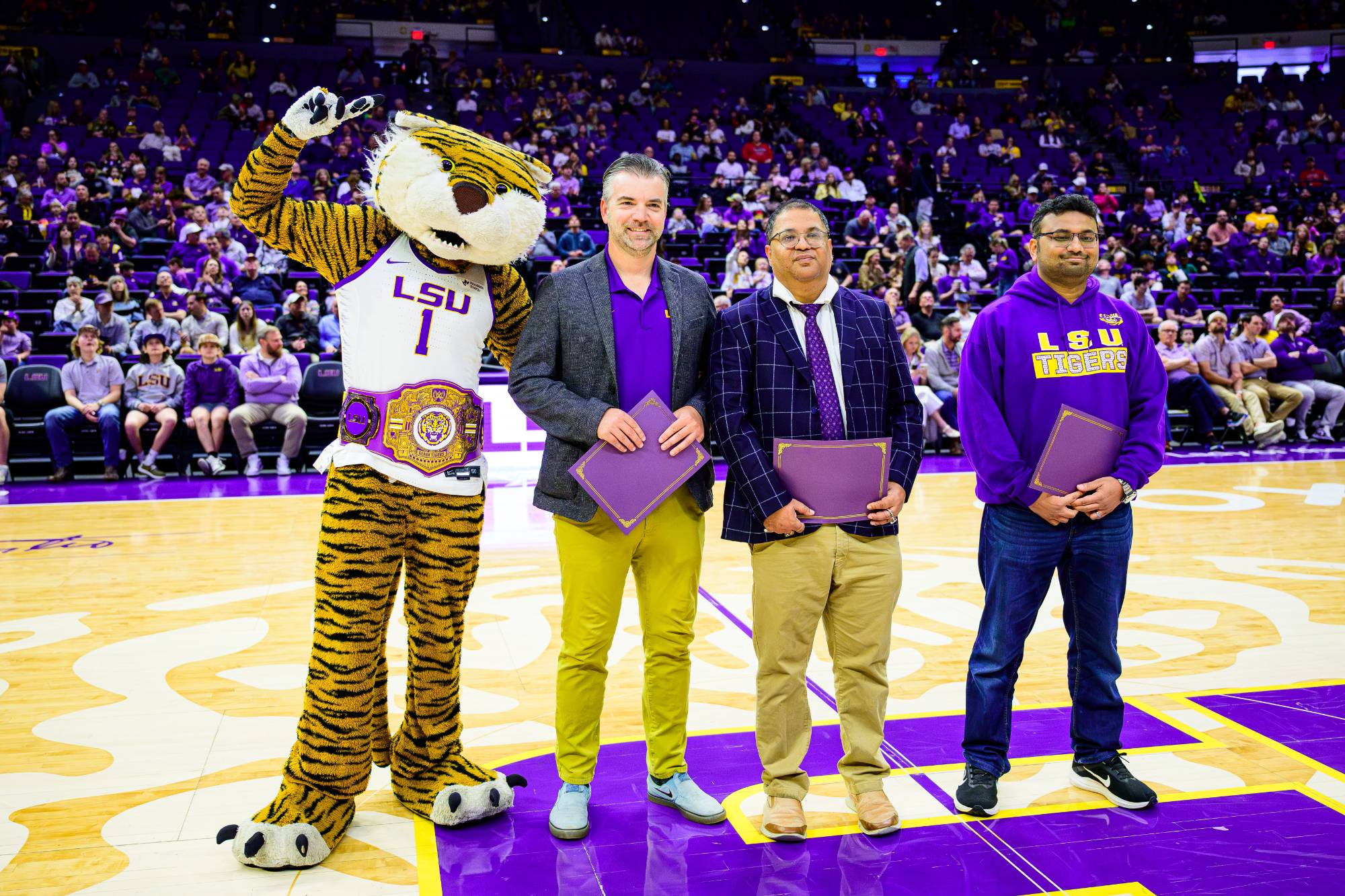 Members of the DeepFire team were honored at a Men's Basketball game Members of the DeepFire team were honored at a Men's Basketball game