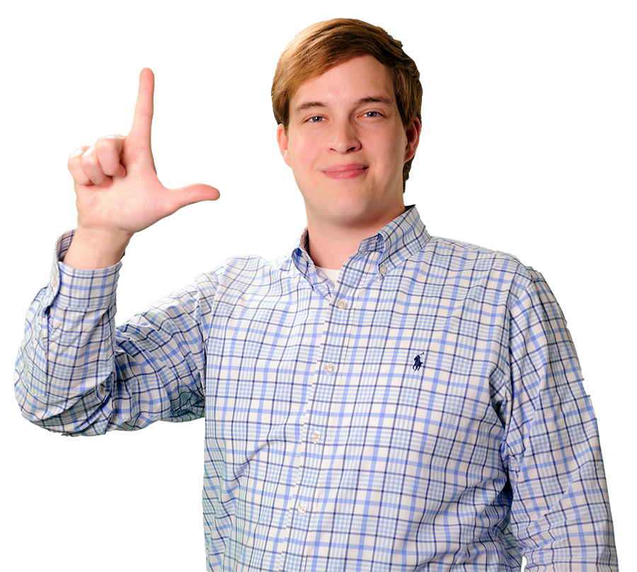 Wesley Powell in a blue shirt with his hand in an L