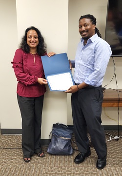 Outstanding Non Traditional Student Awardee Erik Adams and Awards Chair Asiya Alam