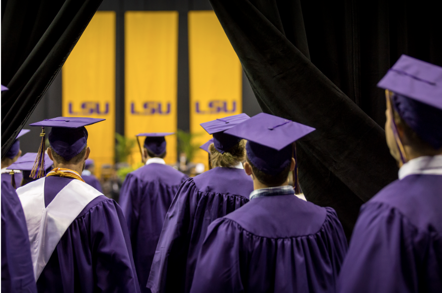 students in cap and gowns