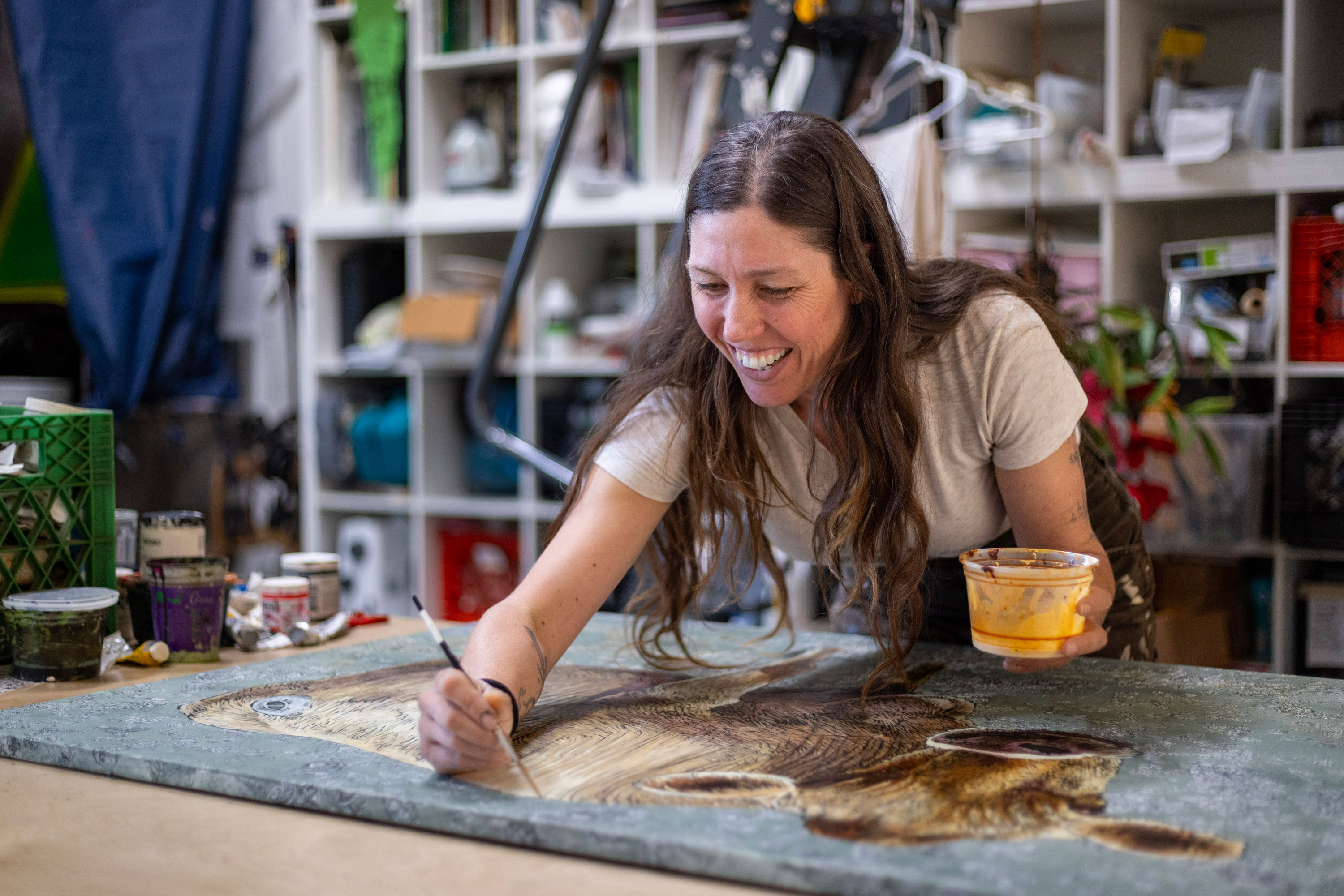 Pippin Frisbie-Calder working in her studio